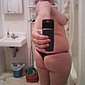 Hausfrau fotografiert sich selbst nackt